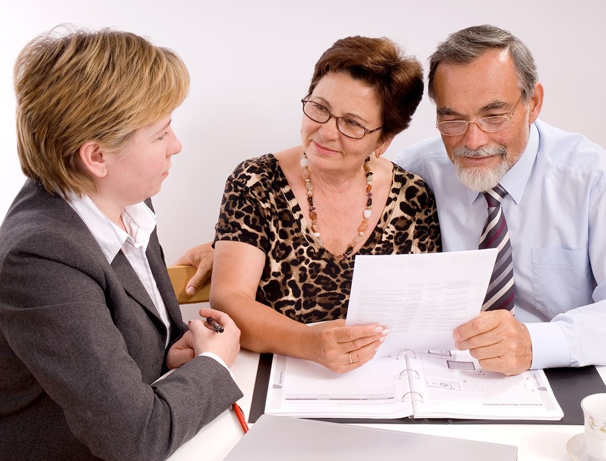 Mature Couple Talking to Financial Planner